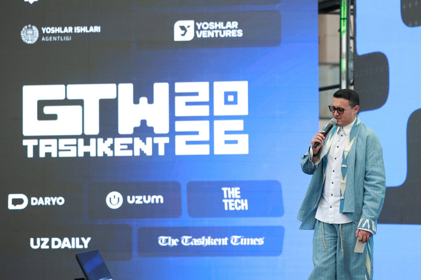 Host on stage at GTW Tashkent 2026